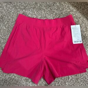 Lululemon New w/Tags Stretch Woven Relaxed Fit HR Short 4”. Cherry Mist. Size L.